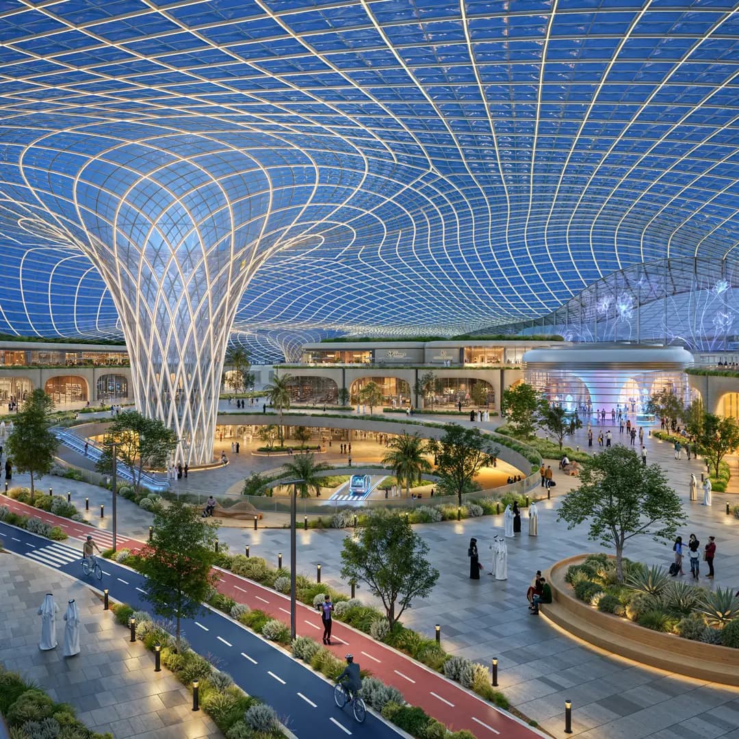 Climate-controlled spine at Wadeem with a glass canopy, trees, cycling lanes and a retail plaza